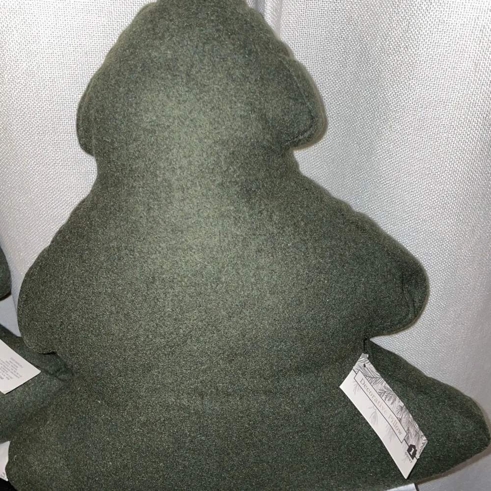 Two green Christmas tree‎ pillows -target bullseye section